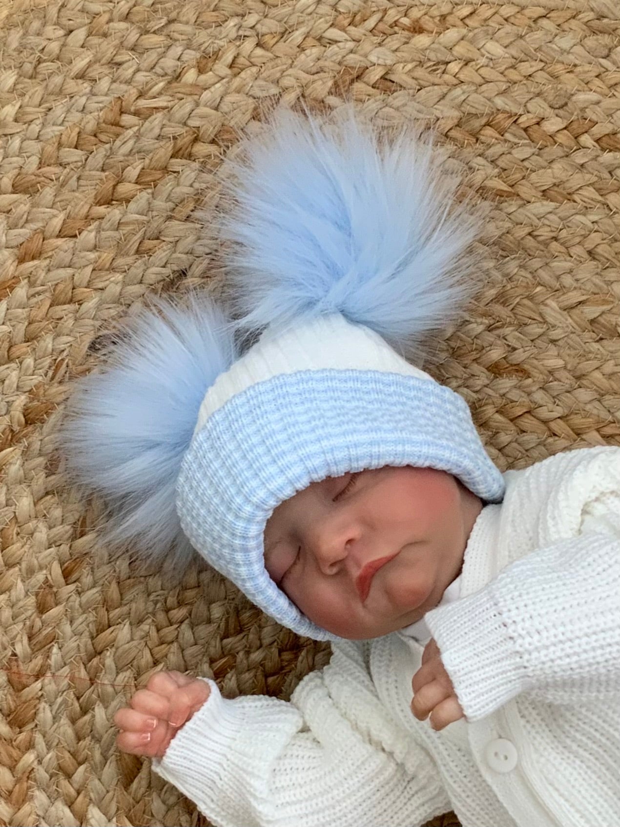 BOBBY baby boys oversized blue faux fur pom pom white hat blue stripe