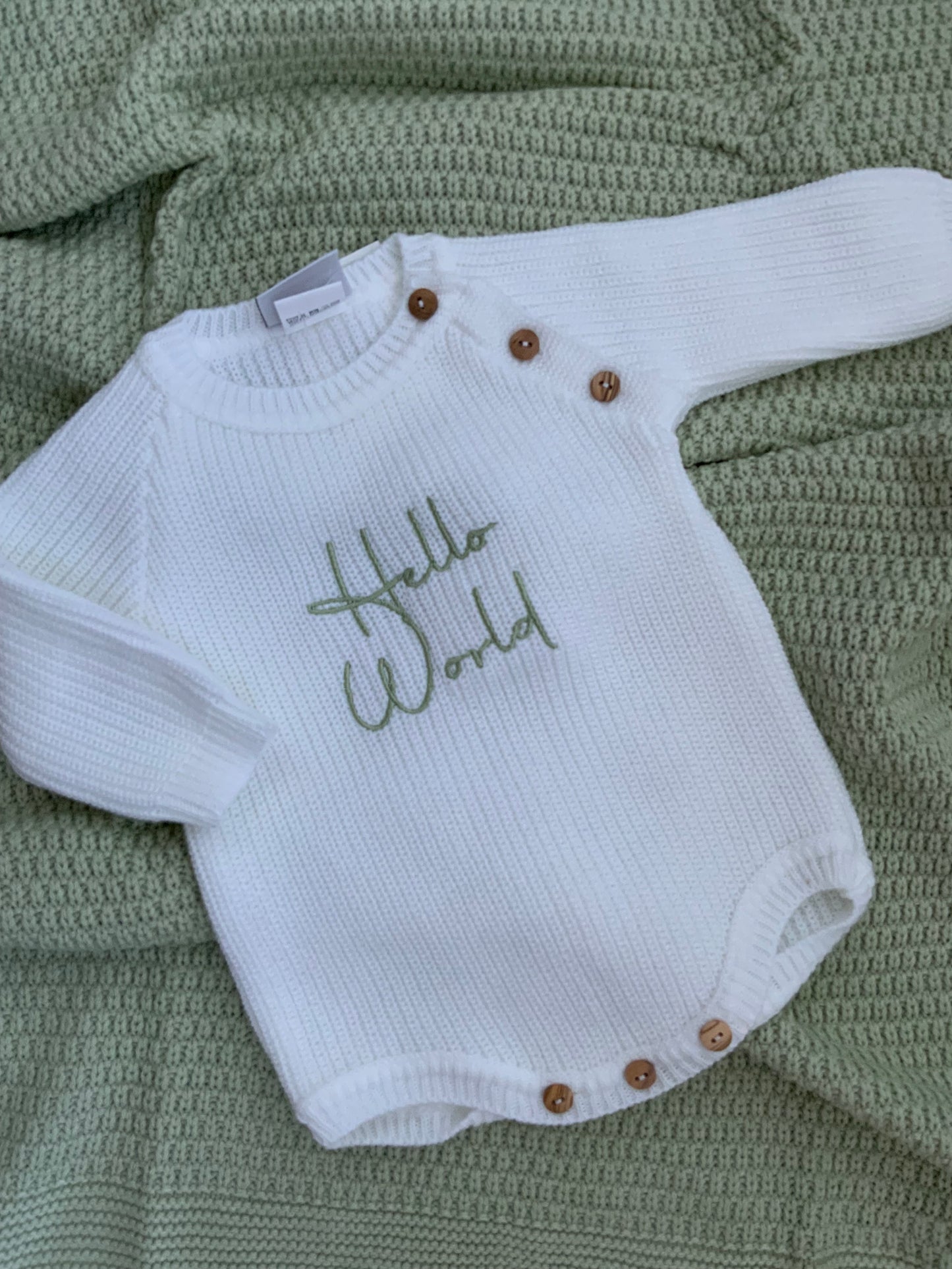 HELLO WORLD pistachio font embroided knitted romper in white