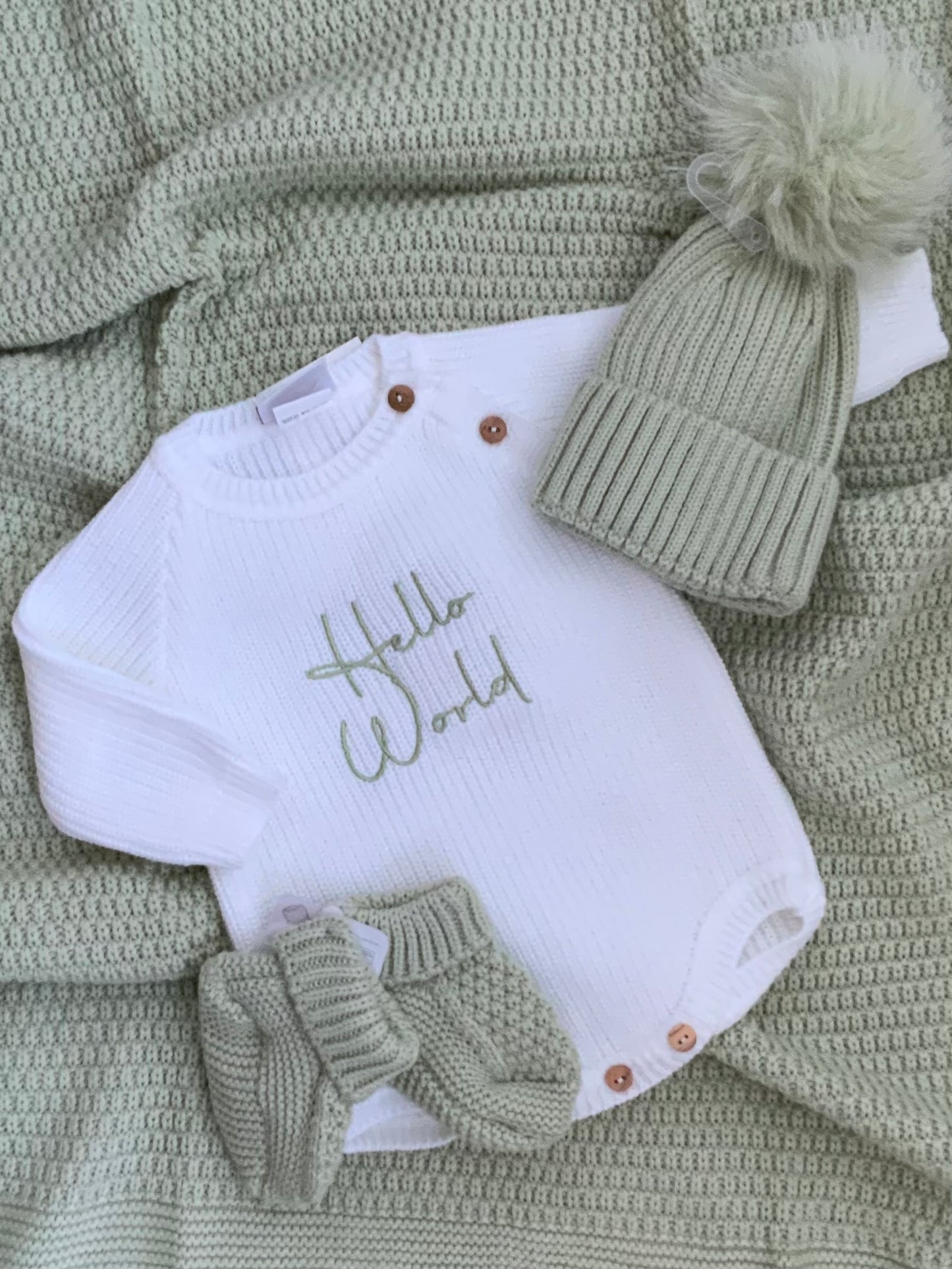 HELLO WORLD pistachio font embroided knitted romper in white
