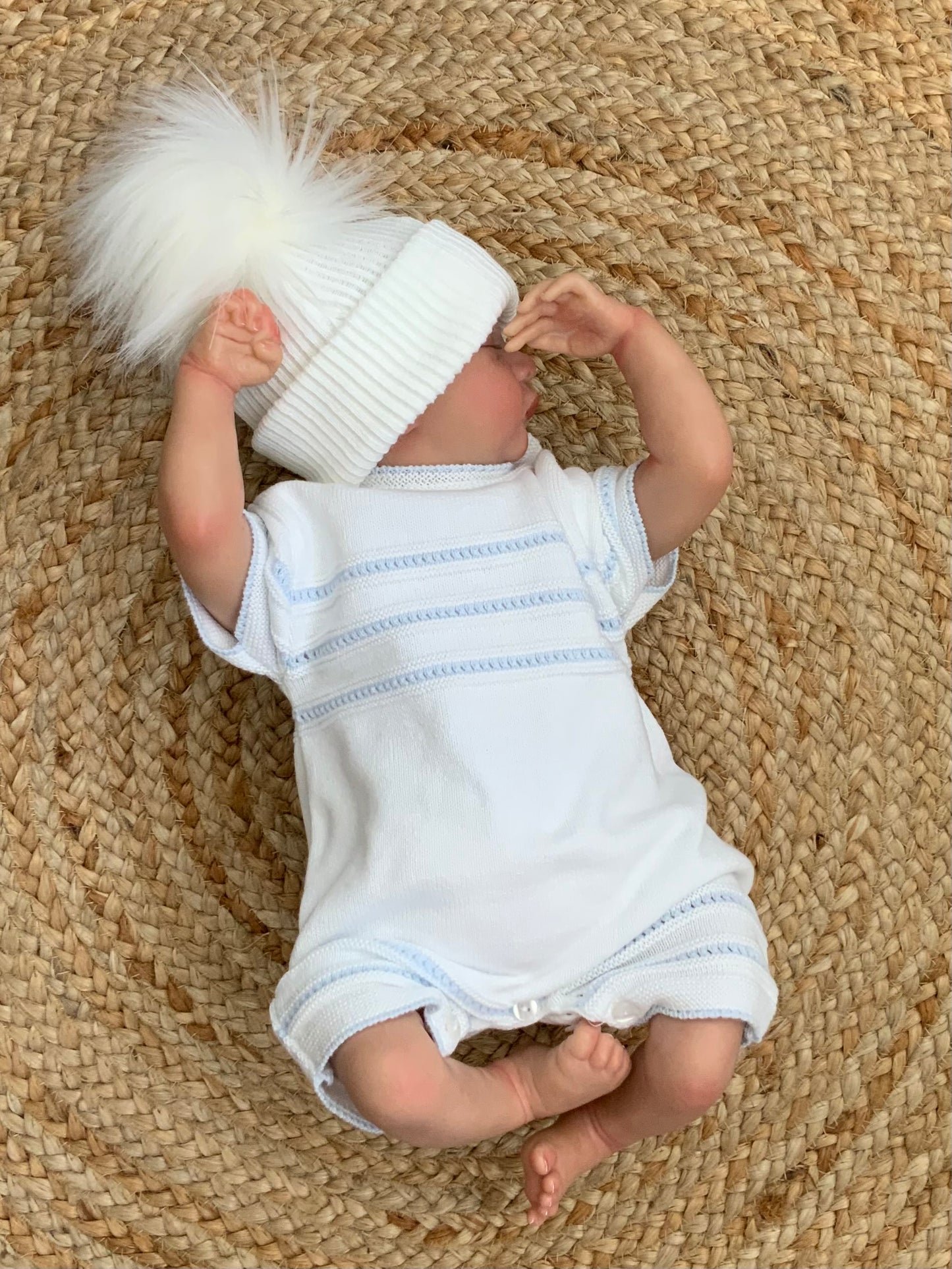 ROCCO babies knitted all in one romper blue pointelle knit